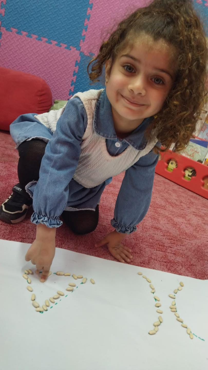 Learning Letters Through Play and Experience